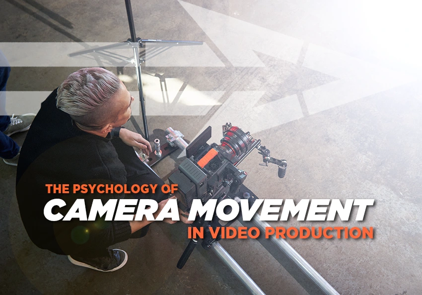 A cinematographer using a camera on a Dana Dolly.