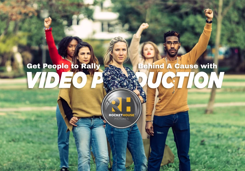 People standing on a field with their fists up.