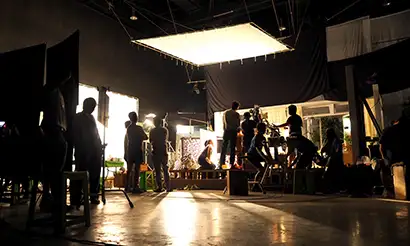 Video Production crew lighting a set.