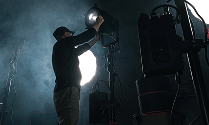 Lighting and grip tools arranged for a production setup.